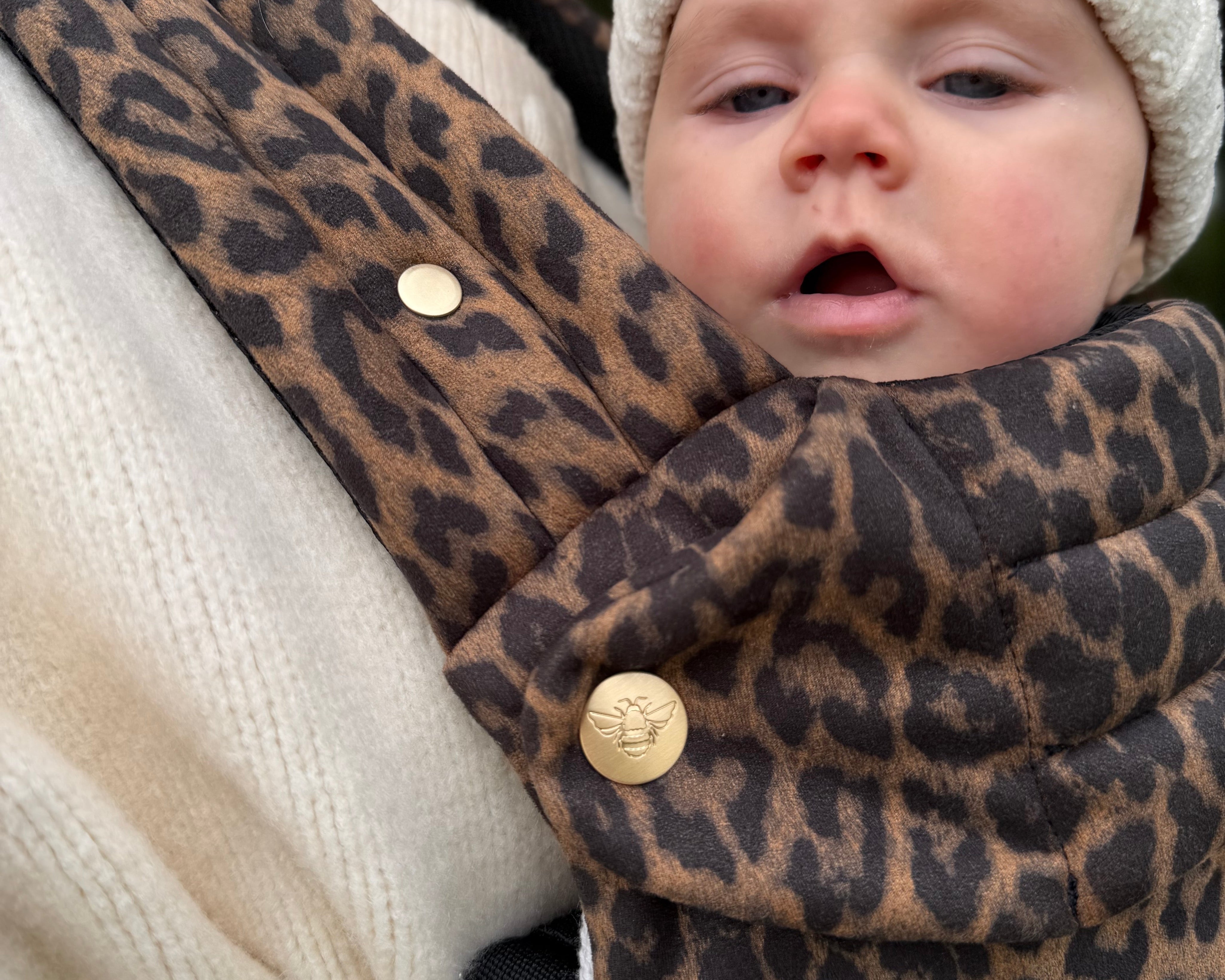 Leopard print baby carrier