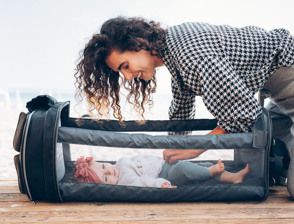 Baby Travel Crib Changing Bag - The POD® is an extraordinary changing bag which opens out into a comfortable cot to save you both time and space.